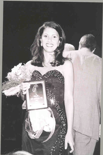 Ms. LSU poses with her award at Ms. Louisiana-USA Pageant