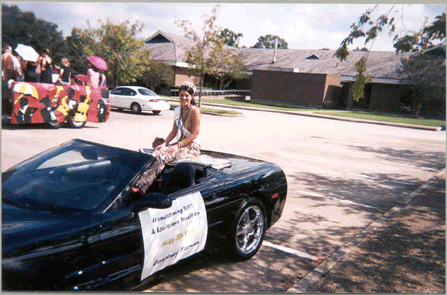Ms. LSU poses in her car at the Homecoming Parade